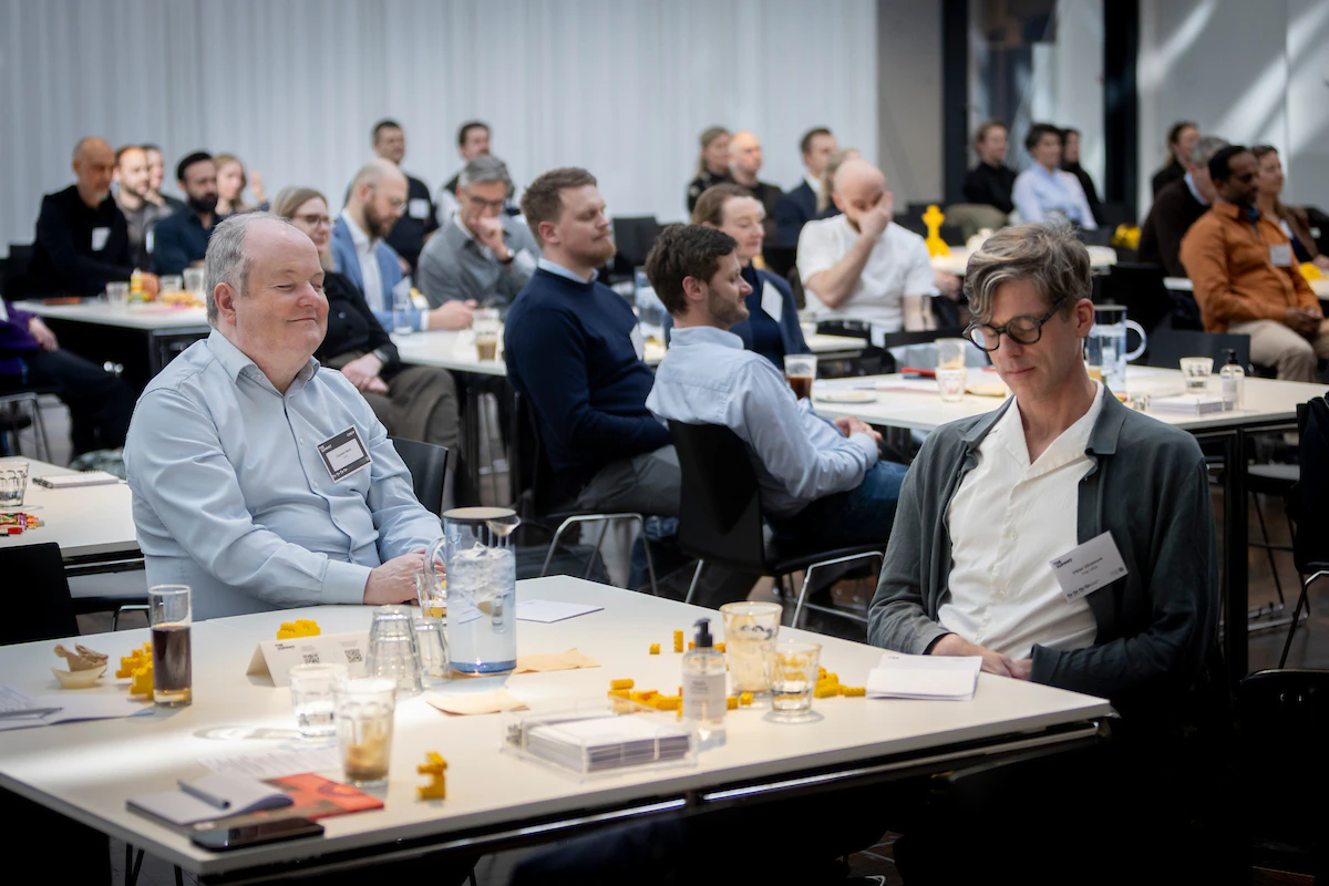 A room full of Nordic leaders embody being a decomposer fungi at the 2026 The Summit hosted by Copenhagen Institute for Futures Studies and Danish Industry.