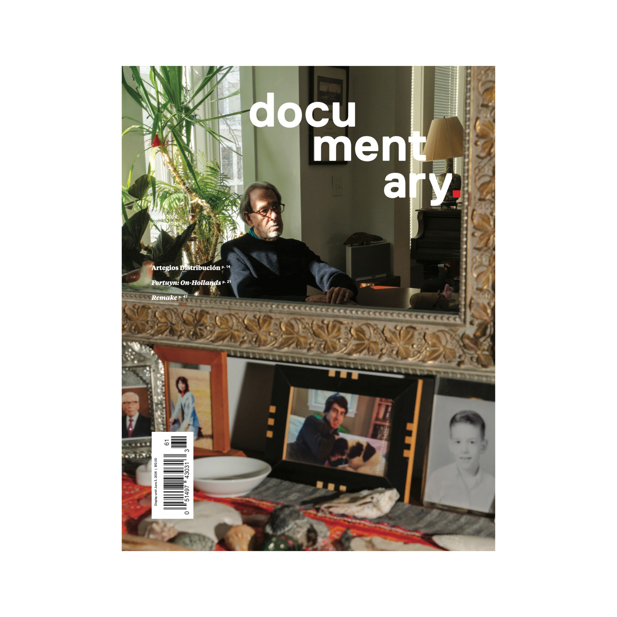Cover of Documentary magazine's spring 2026 issue, showing the reflection of an older white man with glasses and grey hair sitting down, gazing contemplatively. In the foreground is a blurry mirror as well as family photos and travel keepsakes.