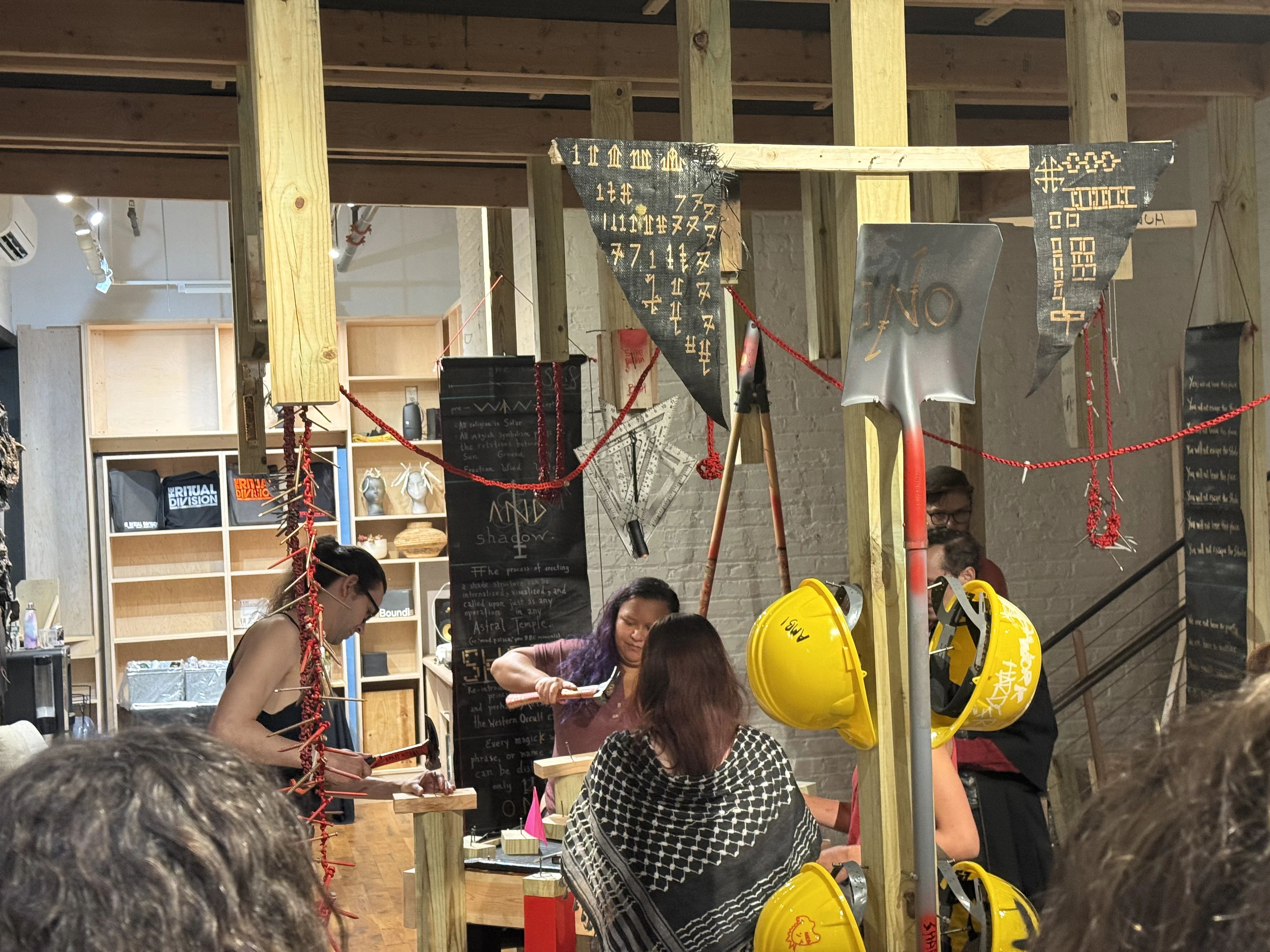 Visitors create the first Shade Switches in the edition during the opening of "As Above, So Below," June 25 2026