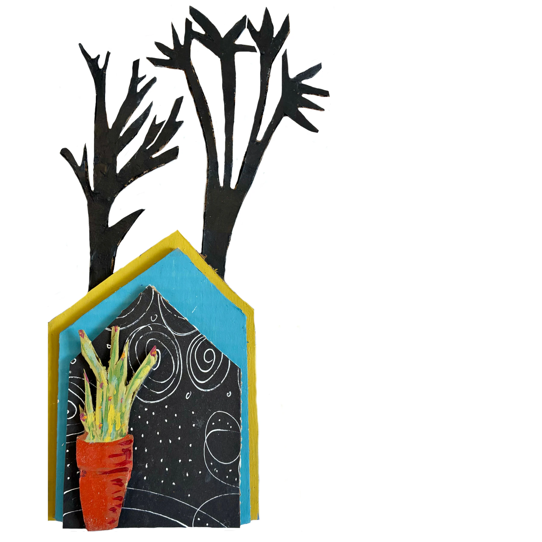 One of my houses made with cardboard, standing out color, with trees.