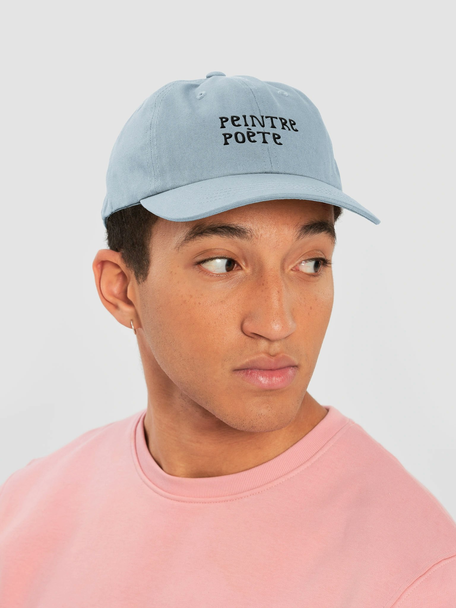 A model wearing a cap 