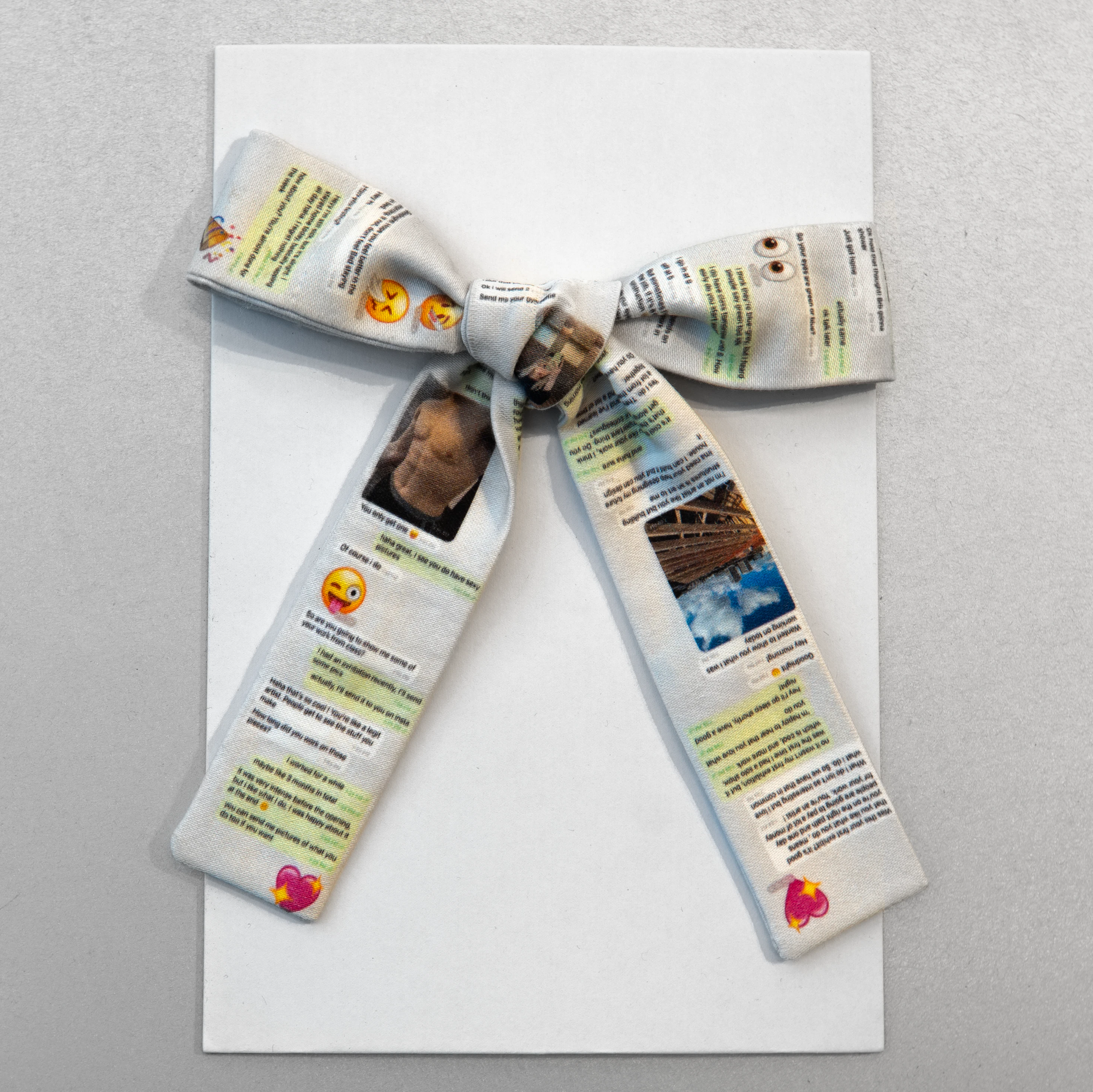 Bow printed with messages that resemble a phone texting app interface.