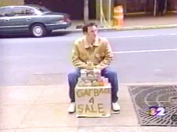 Lil' Justin selling Garbage on the street in front of MoMA way back in 2001.