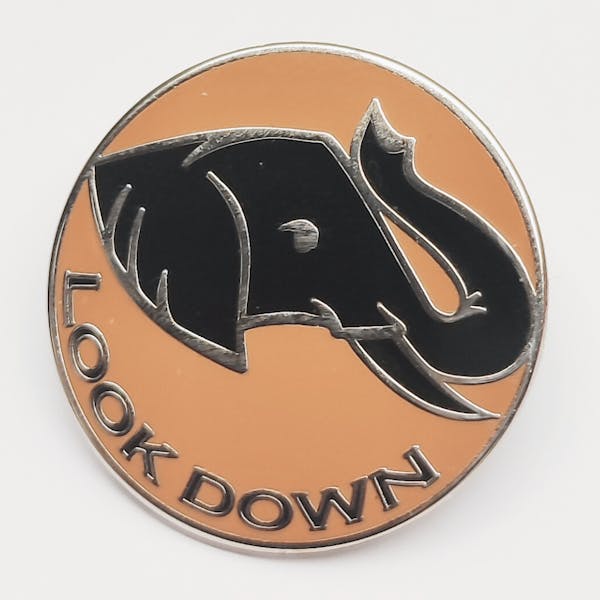 The Black Elephant Lapel Pin & Logo