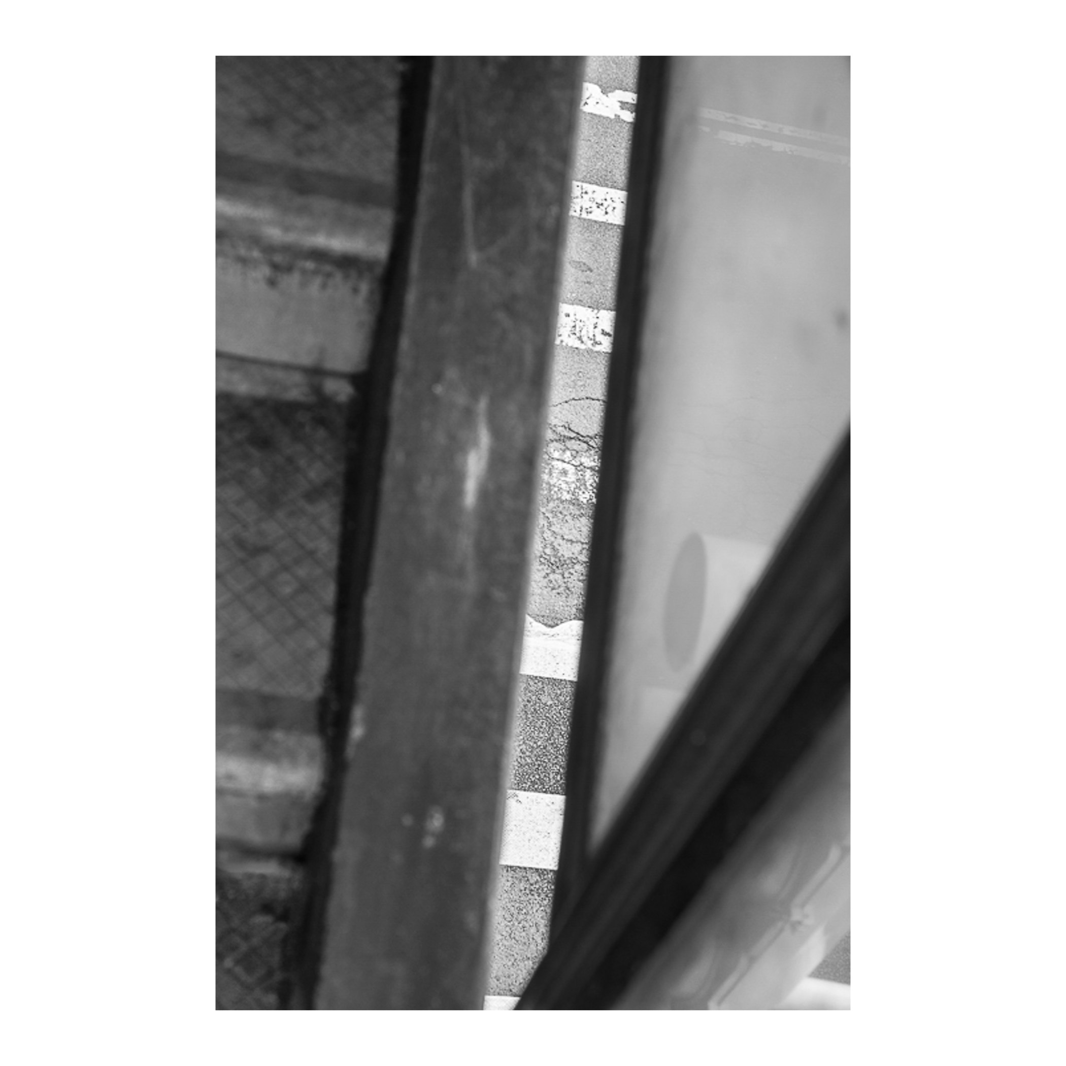 Image file 3_9555 [view from an elevated subway station’s stairway], archival pigment print, image 5⅓x8 inches on 8½x11 Canson Rag Photographique paper (310gsm)