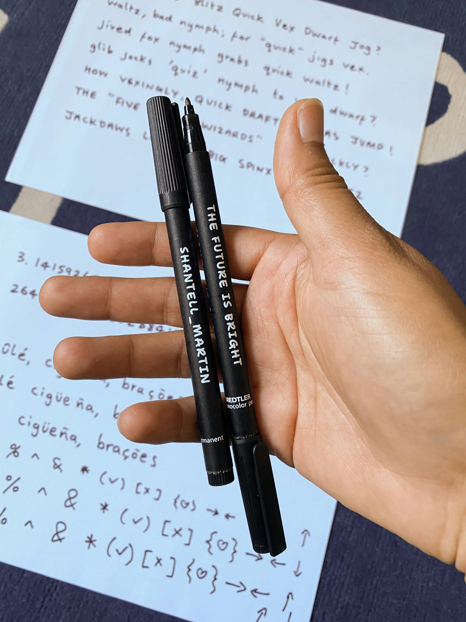 To gather samples of her handwriting, Shantell wrote several pangrams and a collection of symbols with a favorite marker, the Staedtler Lumocolor M