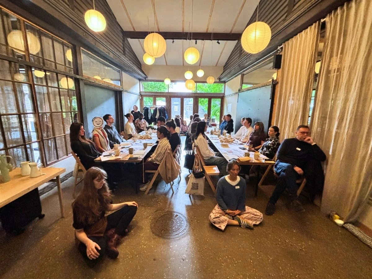 A room of futures thinkers embodies a decomposer fungi at Sporesight's official Future Days 2026 side event in Copenhagen.
