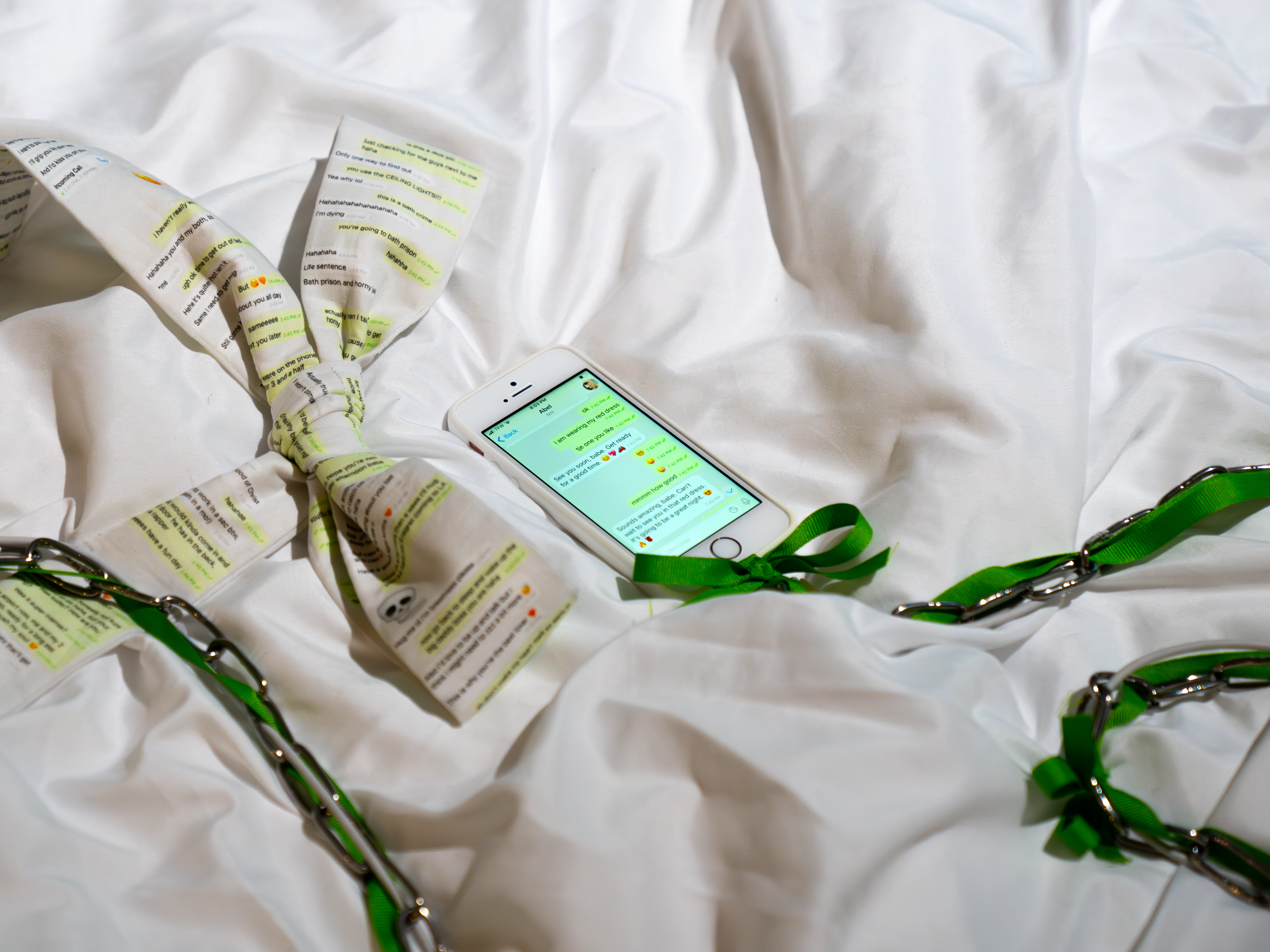 Bows printed with text messages in Abel & I (2024).